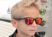 boy-wearing-red-mirrored-sunglasses Blonde Boy wearing red mirrored sunglasses from Maple Grove Eye Doctors