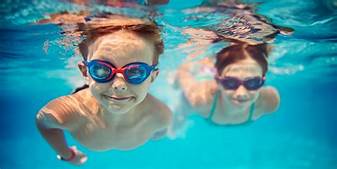 Kids with swim goggles Maple Grove Eye Doctors at Pearle Vision