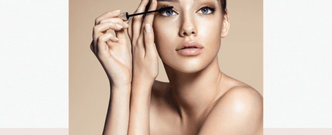Woman applying mascara to right eye Maple Grove Eye Doctors at Pearle Vision
