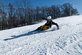 Snowboarding on icy slopes Maple Grove Eye Doctors at Pearle Vision
